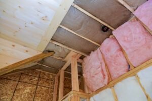 covering-view-layers-pink-fiberglass-insulation-cold-barrier_73110-8052