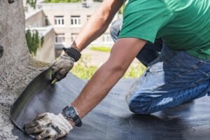 worker-performs-overhaul-roof-residential-building_181624-61003